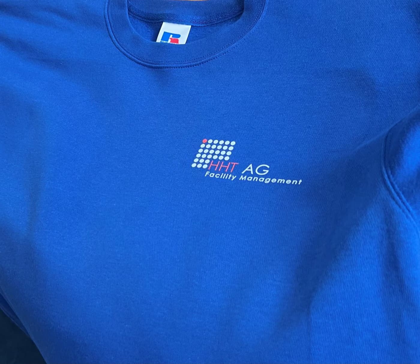 HHT AG Facility Management: Stickerei